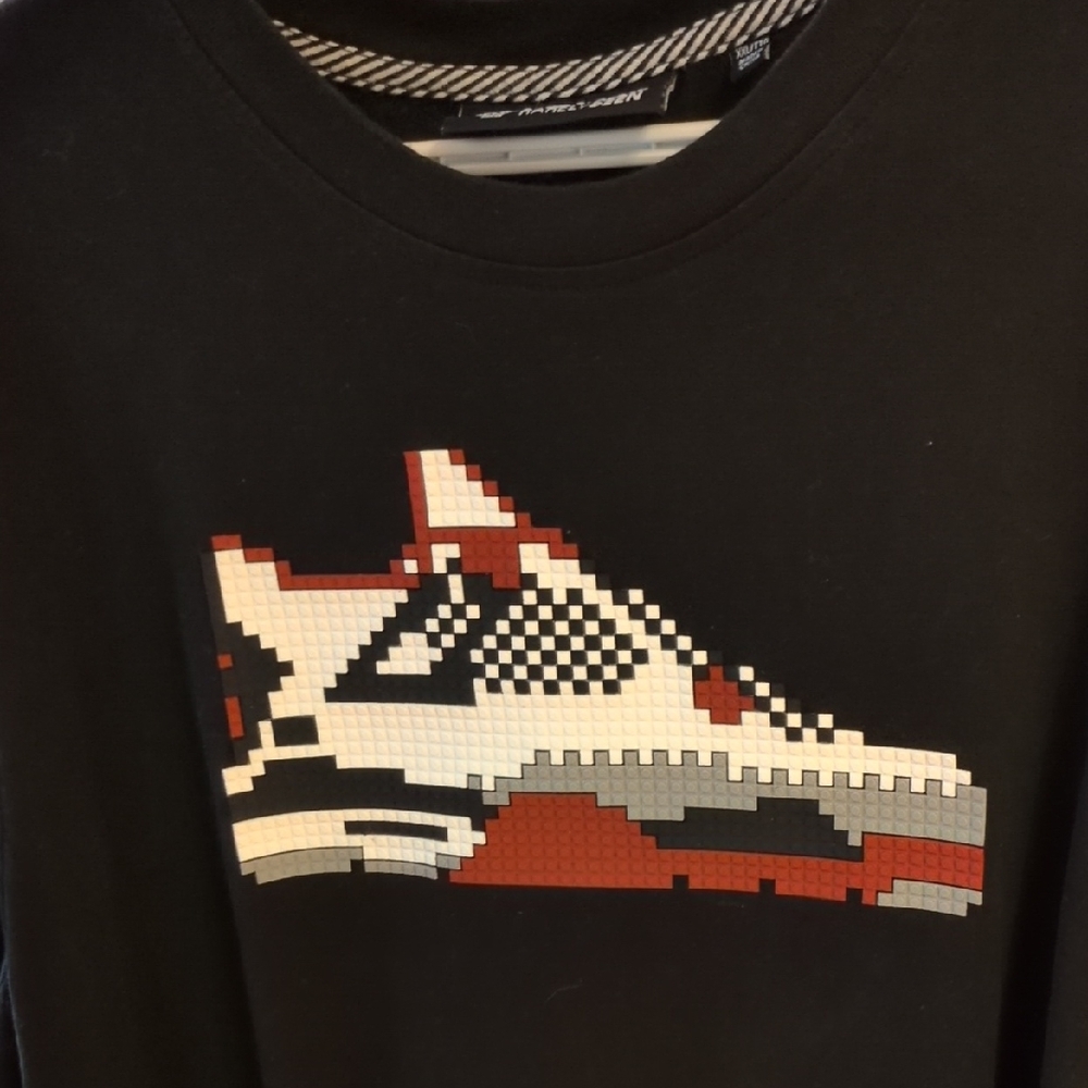 Mostly Heard Rarely Seen Black Tee with Pixel Sneaker